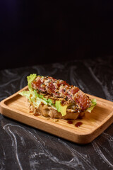 Enjoy a Delicious Lettuce Wrap with Tasty Toppings and Sauce, Perfect for Any Meal