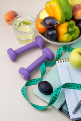 The concept of a healthy lifestyle, sports, fitness, healthy nutrition, daily routine. A plate with...