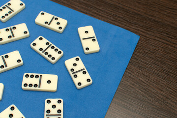 Dominoes bones on blue background	