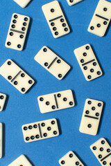 Dominoes bones on blue background	