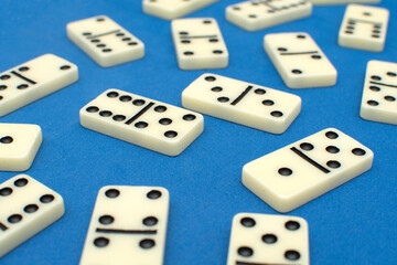 Dominoes bones on blue background	