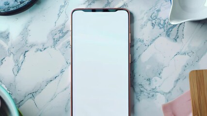 Isolated smartphone with blank white screen on the kitchen countertop table
