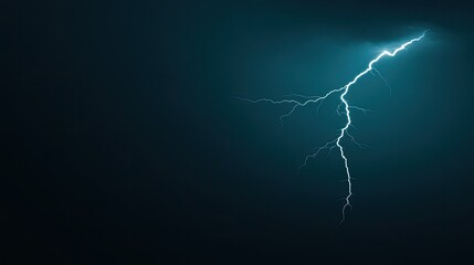 A brilliant lightning strike fractures the night sky, creating a captivating contrast against the dark backdrop with a grainy texture from the film used