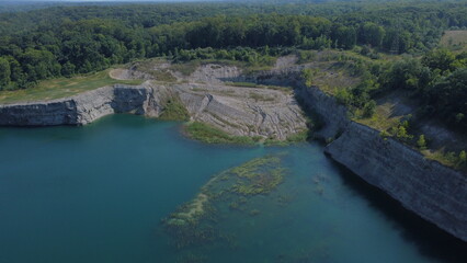 Fototapeta premium Drone Shot of a Water-Filled Quarry In Independence, Ohio