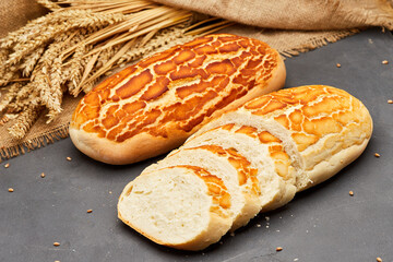 Freshly baked tiger bread loaf with crispy golden crust, perfect for sandwiches and toast