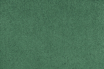 Plain green colored microfiber detail texture, suede leather structure, textile background