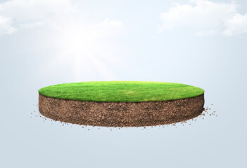 Green grass surface and soil with floating slice of land. Soil texture and flying land grass texture. 3d rendered, Floating in air with clouds and manipulation.