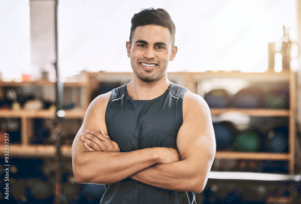 Sticker Man, portrait and confident in gym for fitness, strength training and exercise for muscle development or growth. Male person, arms crossed and happy in sports center for physical cardio and workout.