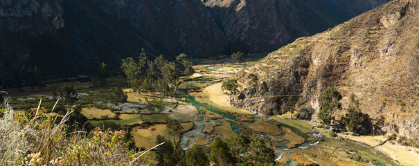 Mountain valley with winding river view in Huancaya, Yauyos, Peru
