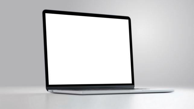 A sleek laptop is open and idle on a smooth surface, showcasing a blank screen in a well-lit environment