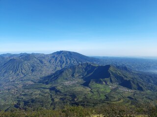 beautiful view of the hills photo taken from the top of the mountain. mountain landscape wallpaper