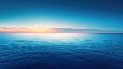 Obraz premium Blue horizon over the ocean at dawn, tranquil and serene seascape, peaceful morning