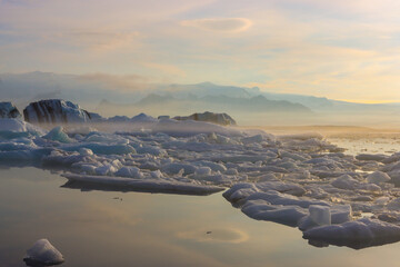 Diamond beach at Jokulsalorn Lagoon in Iceland , Glacier lagoon at sunset icebergs and all