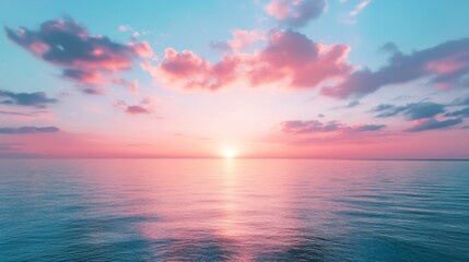 Fototapeta premium Sunset over tranquil ocean with pink clouds