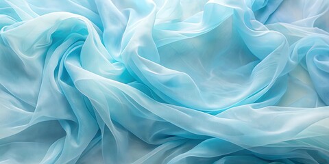 Obraz premium Flowing sheer pastel fabric in soft blue tones creating dreamy abstract background with copy space, pastel, fabric