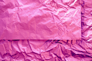 bright pink crumpled paper texture background