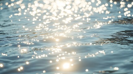 Close-up of sparkling water surface reflecting sunlight.
