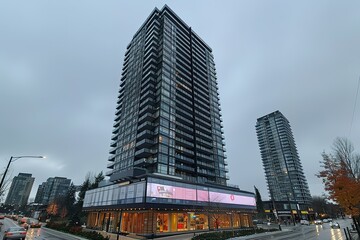 A large building with a sign on it that says "The Plaza"