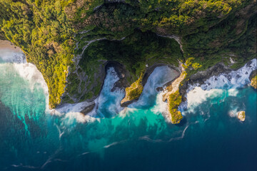 Drone view panorama of seaside cliffs in Bali, Indonesia