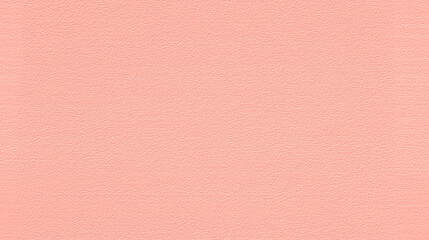 a seamless texture of slightly textured colored paper in peach pink color