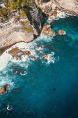 Drone view panorama of seaside cliffs in Bali, Indonesia