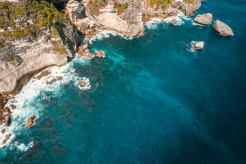 Drone view panorama of seaside cliffs in Bali, Indonesia