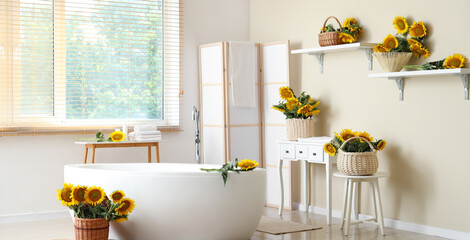 Bathroom interior full of beautiful sunflowers