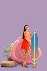 Smiling young woman with surfboard, palm and inflatable mattress on lilac background