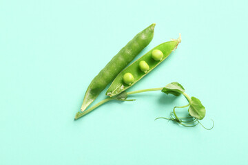 Green peas on turquoise background