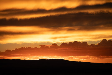 Marvelous red orange clouds in sunset sky