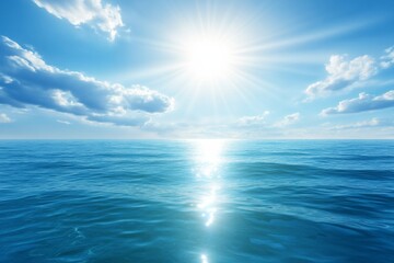 Obraz premium Serene Ocean with Clear Blue Waters and Bright Sunlight, Reflecting Light on the Horizon with Scattered White Clouds