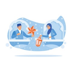 Muslim man holding a star. Muslim woman holding a lantern. Ramadan Kareem concept. Flat vector illustration.
