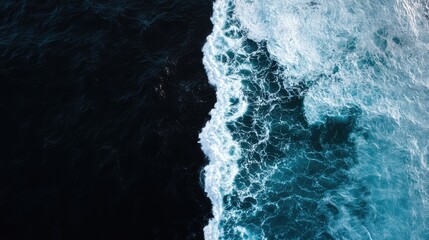 High-resolution ocean image, split evenly between white and black, captured from above with minimalistic elegance.