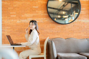 The female executive’s office was equipped with a cutting-edge laptop that enabled her to handle...