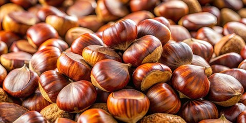 Obraz premium A vibrant heap of chestnuts straight from the local nut farm, perfect for celebrating autumn flavors and culinary traditions