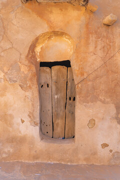 Tataouine, Tunisia. Weathered wooden door in the ancient Berber town of Ksar Ouled Soltane.