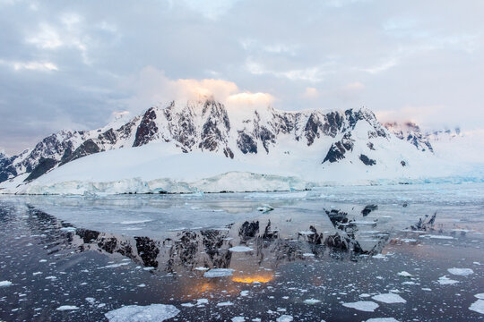 Lemaire Channel, Antarctica. Quiet reflection of a mountain on the Lemaire Channel.