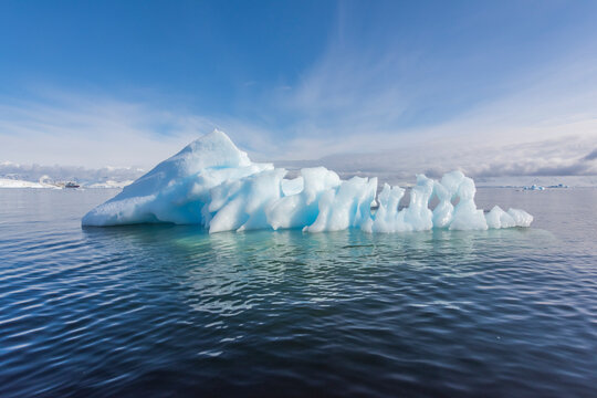 Cuverville, Antarctica. The shallow waters between Cuverville and Ronge islands often trap and ground icebergs.