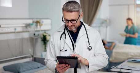 Man, doctor and typing on tablet at clinic for Telehealth consultation, healthcare charts and medical. Physician, digital and review surgery schedule, diagnosis report and prescription information - Powered by Adobe