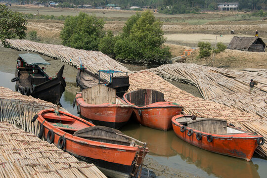 Bangladesh, Chittagong, District of Cox Bazar, Maheshkhali Island (aka Maheshkali, Mahesh Khali, Moheshkhali) Local boats with bamboo.