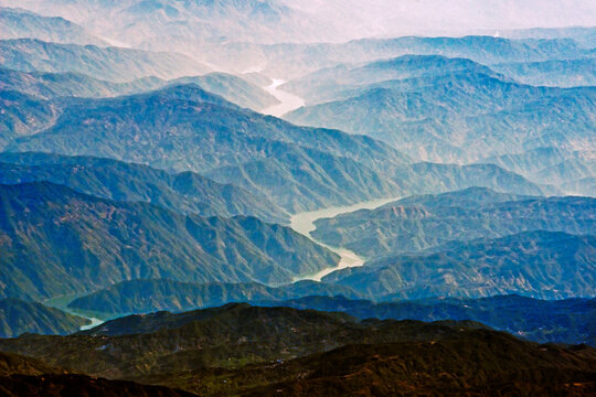 Aerial view of Irrawaddy River winding through the mountain, South Asia