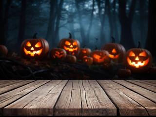 Wooden table and blurred Empty  Halloween night background. Tombs. Bats. Pumpkins. Blank of Halloween for the Product. Advertise. Mockup. Copy Space.