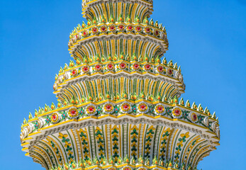 Colorful ceramic Chedi spire pagoda, Wat Pho Temple, Bangkok, Thailand. Built in 1600's. One of the oldest temples in Thailand.