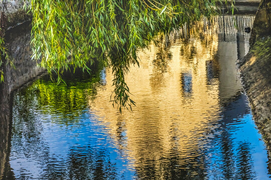 Colorful Aure River reflection, Bayeux, Normandy, France. Bayeux founded 1st century BC, first city liberated after D-Day