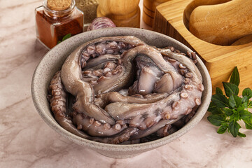 Raw cold octopus for cooking