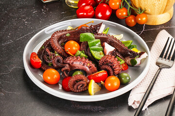 Salad with octopus tentacle and vegetables