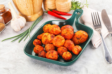 Baked young potato with paprika