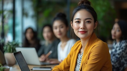 Fototapeta premium Asian woman lead young group of multiethnic businesspeople in team meeting using laptop computer for ESG topic presentation on monitor Sustainable business practice people work at home : Generative AI