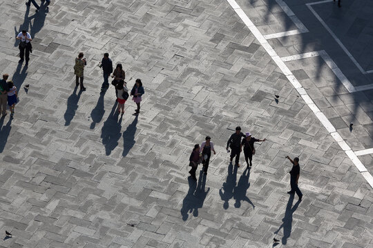 Europe, Italy, Venice. Tourists in San Marco Square seen from  Campanile. 