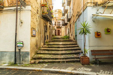 Italy, Sicily, Palermo Province, Castelbuono. Stairs on a narrow side street in the town of Castelbuono.